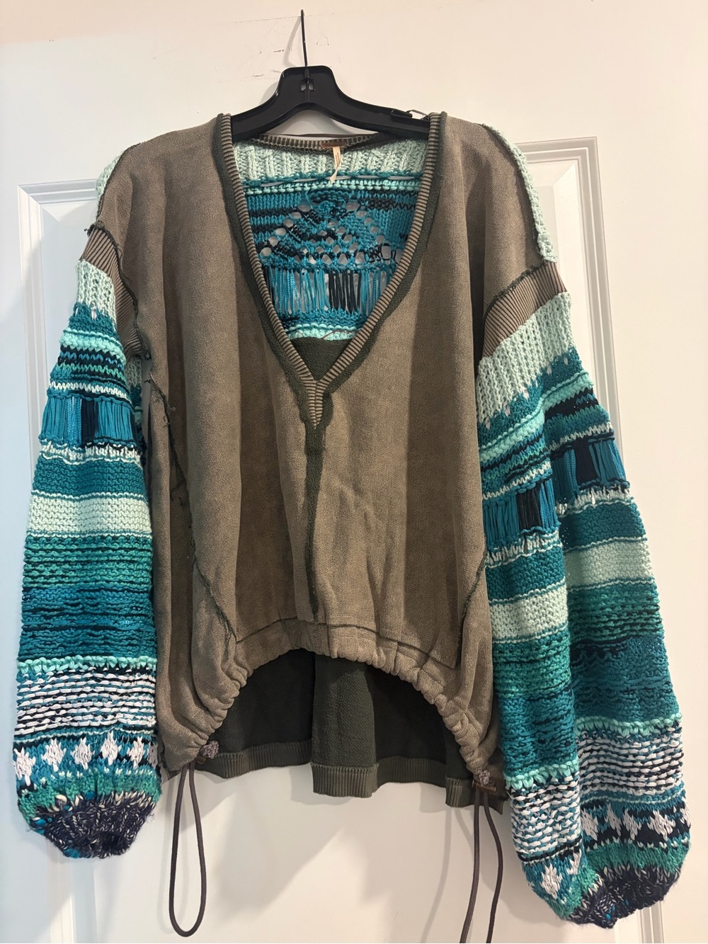 Relaxed V-Neck Knit Sweater with Teal Striped Sleeves by free people